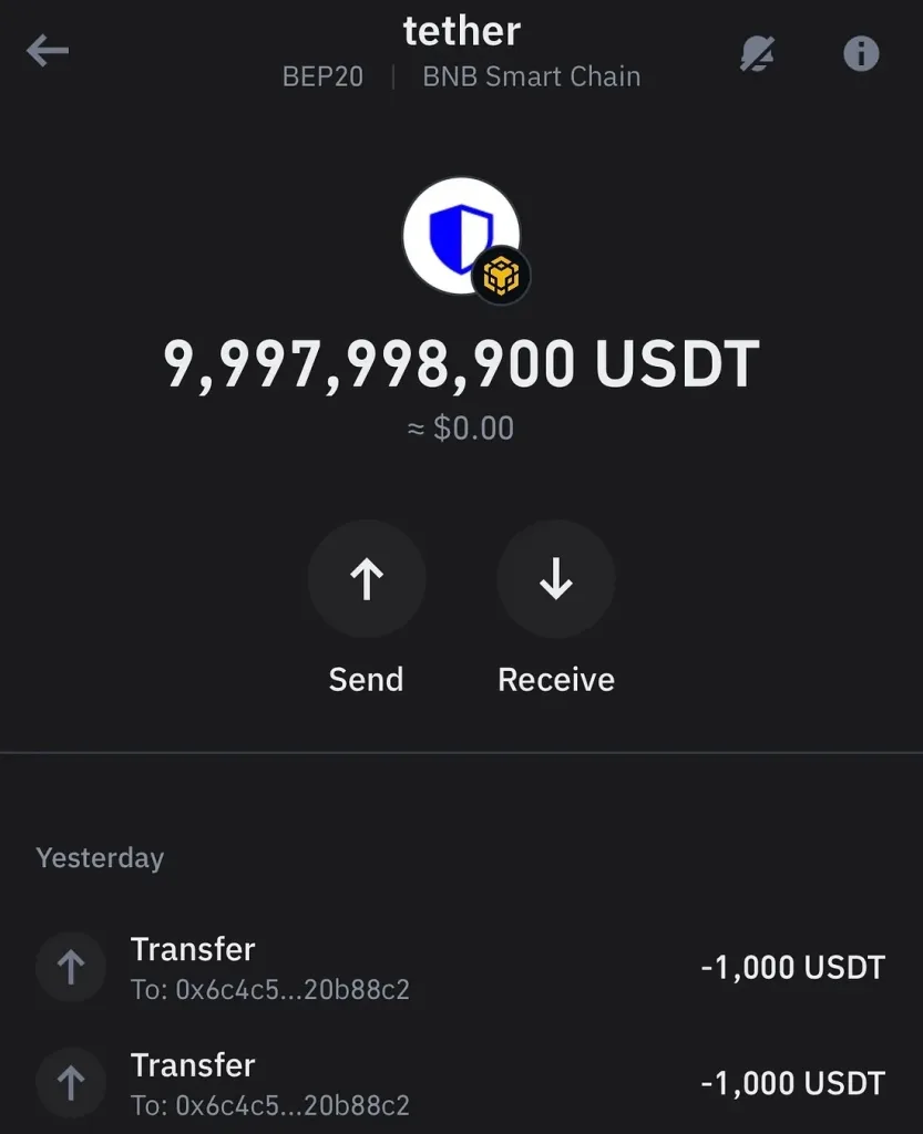 در تصویر، صفحهای از یک کیف پول رمزارز دیده میشود که مقدار عجیب و بسیار بزرگی از تتر، حدود ۹ میلیارد واحد، نمایش داده شده است.
در پایین صفحه چند تراکنش خروجی ۱۰۰۰ تتری دیده میشود که نشان میدهد این موجودی غیرواقعی و بخشی از یک نمایش جعلی یا «فلش تتر» است.