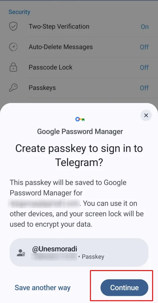صفحه پنجرهی «Google Password Manager» را نشان میدهد که از کاربر میپرسد آیا میخواهد یک Passkey برای ورود به تلگرام ایجاد کند. دکمهی آبی «Continue» در پایین سمت راست قرار گرفته تا کاربر ادامه دهد.