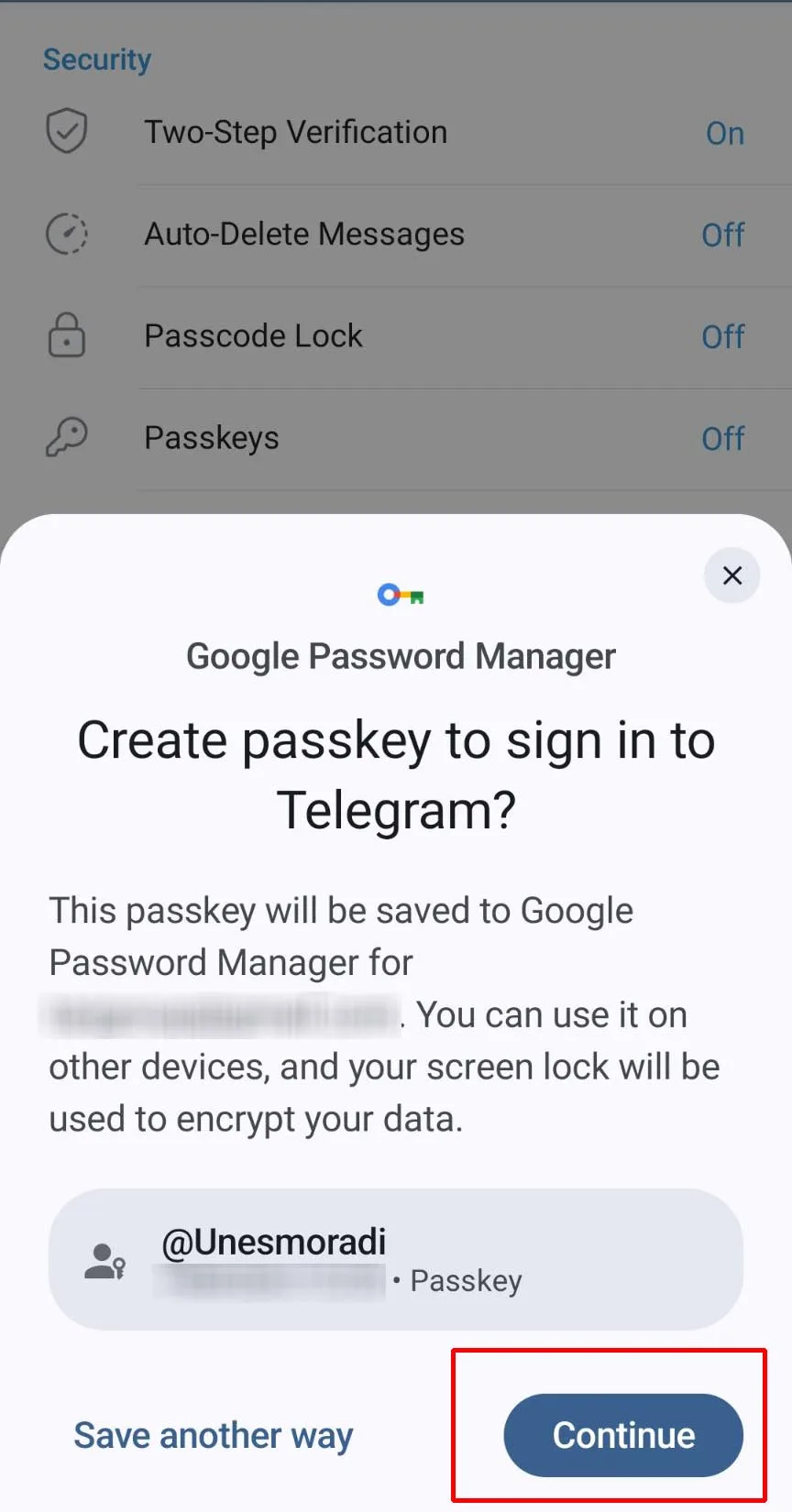 صفحه پنجره‌ی «Google Password Manager» را نشان می‌دهد که از کاربر می‌پرسد آیا می‌خواهد یک Passkey برای ورود به تلگرام ایجاد کند. دکمه‌ی آبی «Continue» در پایین سمت راست قرار گرفته تا کاربر ادامه دهد.