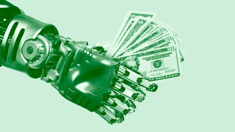 تصویری از یک دست رباتیک با یک مشت اسکناس دلار