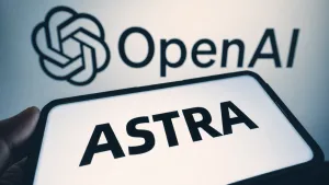 نمای نزدیک گوشی با واژه ASTRA در برابر نام و لوگوی OpenAI، با رنگ‌بندی آبی خاکی و کرم